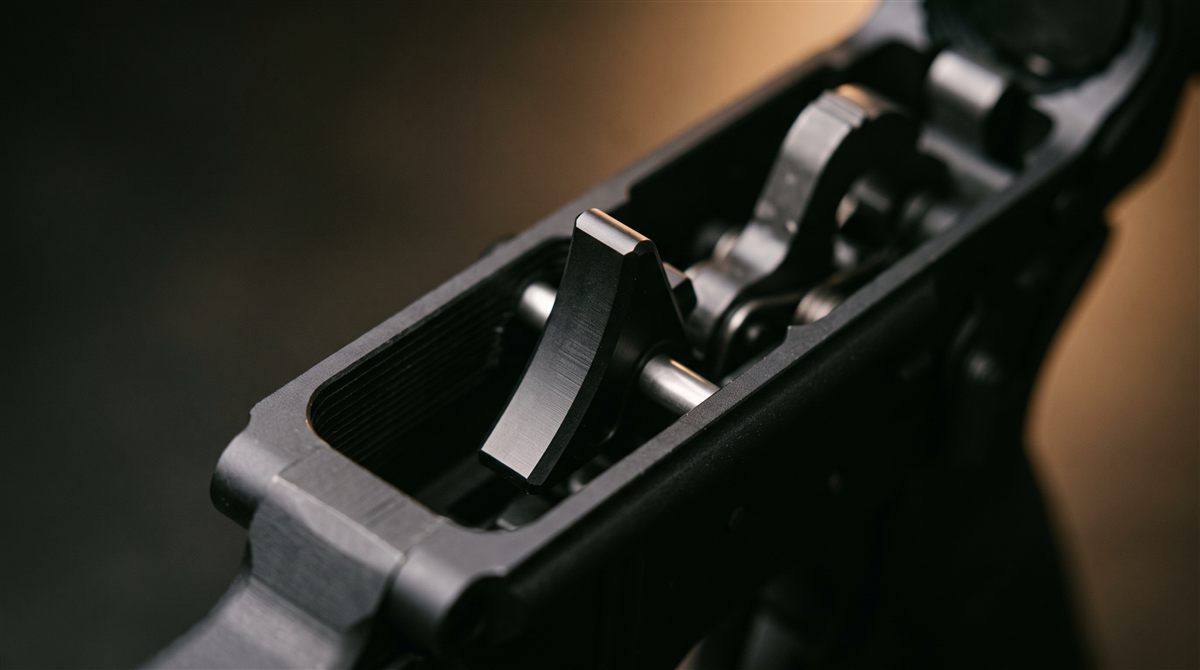 Precision flat trigger installed in a lower receiver